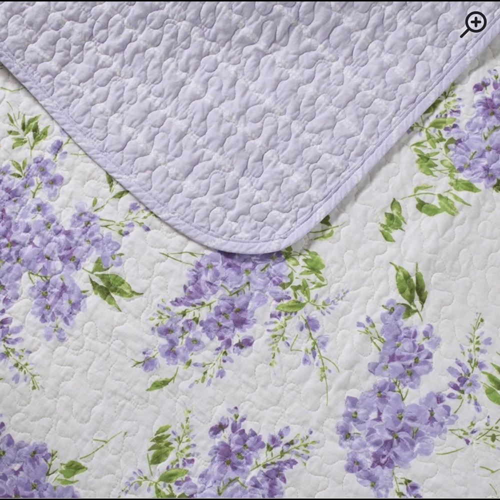 Laura Ashley Quilt/bedspread w/lavender floral. Double sided. New in packaging.